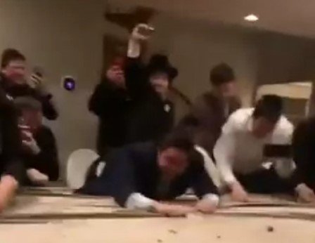 Some Jews play with coins.